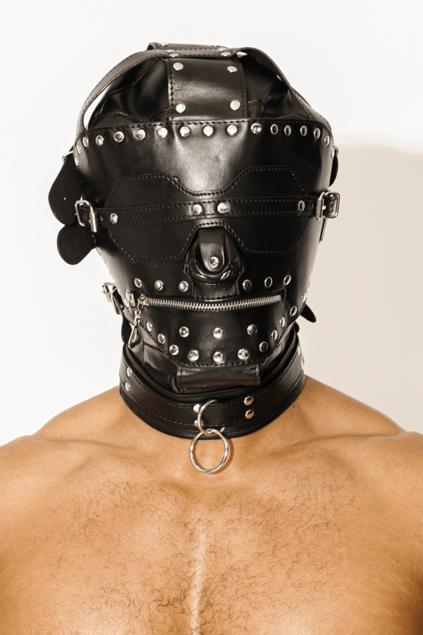Take your playtime to a whole new level with this vegan leather BDSM mask. The back is closed by an engraved lock and key, giving you total control over your partner’s vision and movement. The mask features studded detailing for a rough-and-tumble design making it perfect for the bedroom or BDSM parties. Tags: lingerie for gay men, leather mask, jj malibu canada, lingerie for man