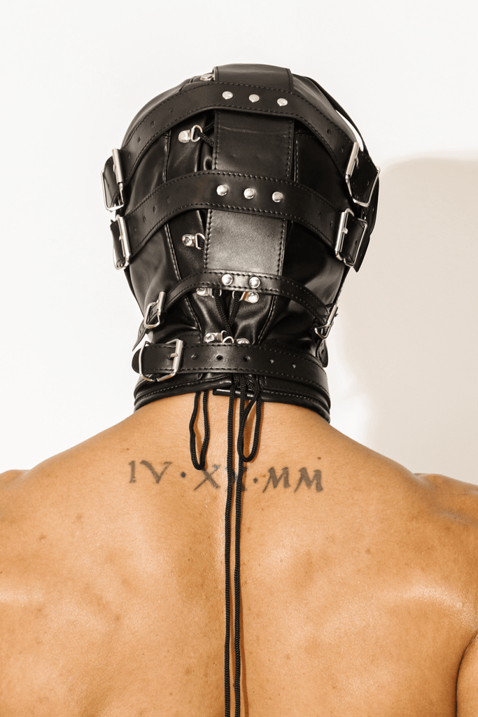 Take your playtime to a whole new level with this vegan leather BDSM mask. The back is closed by an engraved lock and key, giving you total control over your partner’s vision and movement. The mask features studded detailing for a rough-and-tumble design making it perfect for the bedroom or BDSM parties. Tags: lingerie for gay men, leather mask, jj malibu canada, lingerie for man